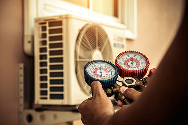 Professional Hvac technician working in Northborough, MA